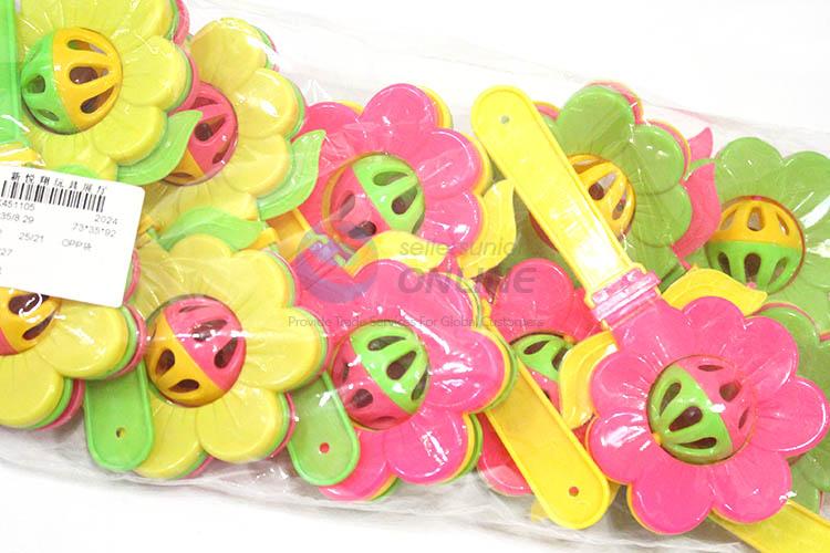 High grade custom flower shape hand bell rattle toy for baby