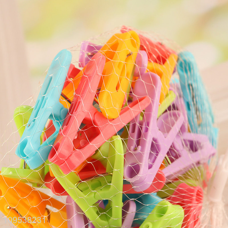 Wholesale colorful 50pcs plastic clothes pegs